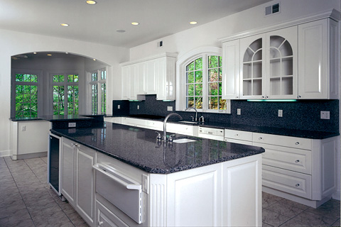 Kitchen with Dupont™ Zodiaq® tops and backsplash